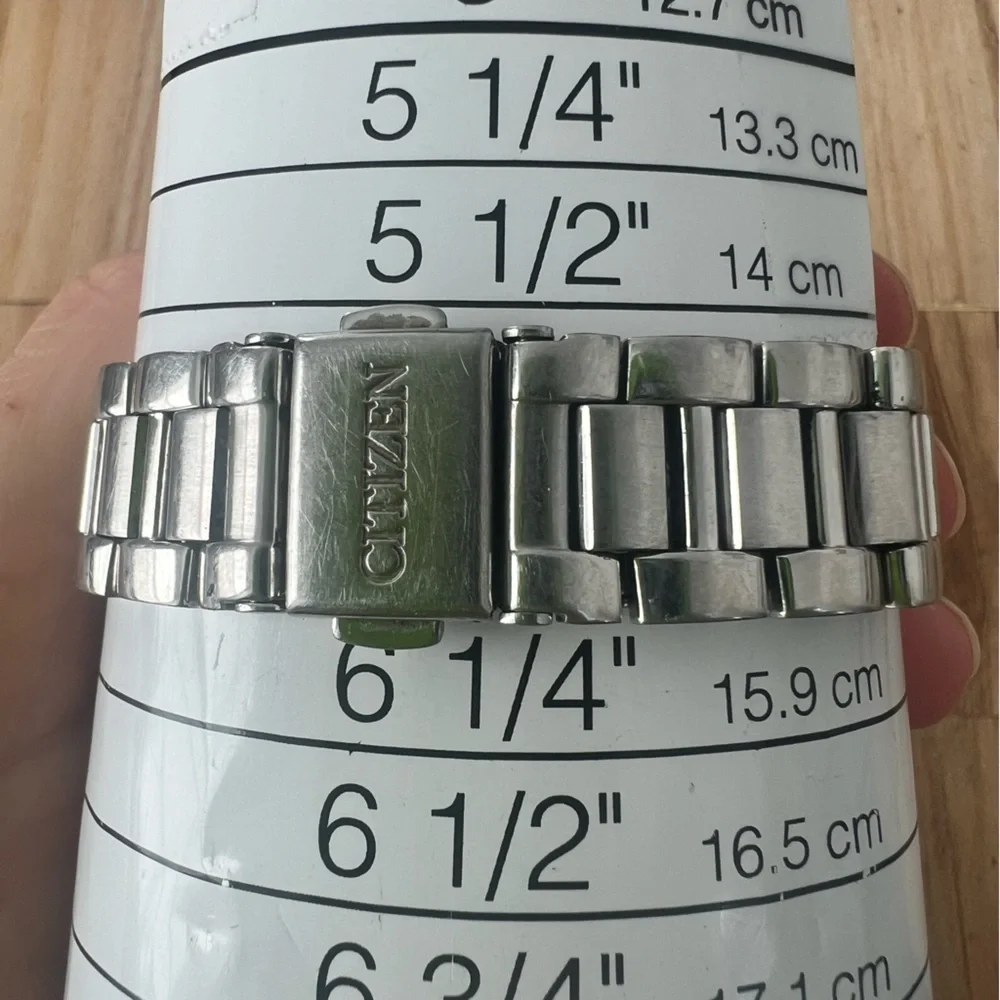Citizen eco-drive ladies silver tone diamond solar dress watch